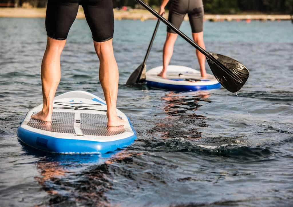 Paddleboarding is a fun way to enjoy the lake at a resort.