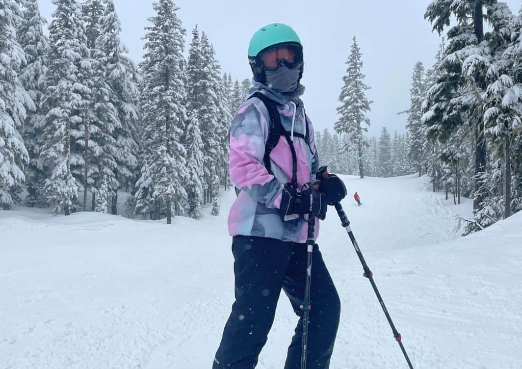 Myself standing on a ski run with my poles.