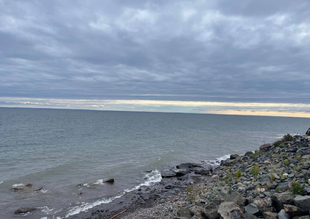 A view of Lake Superior from th shoreline of a hotel in Grand Marais.