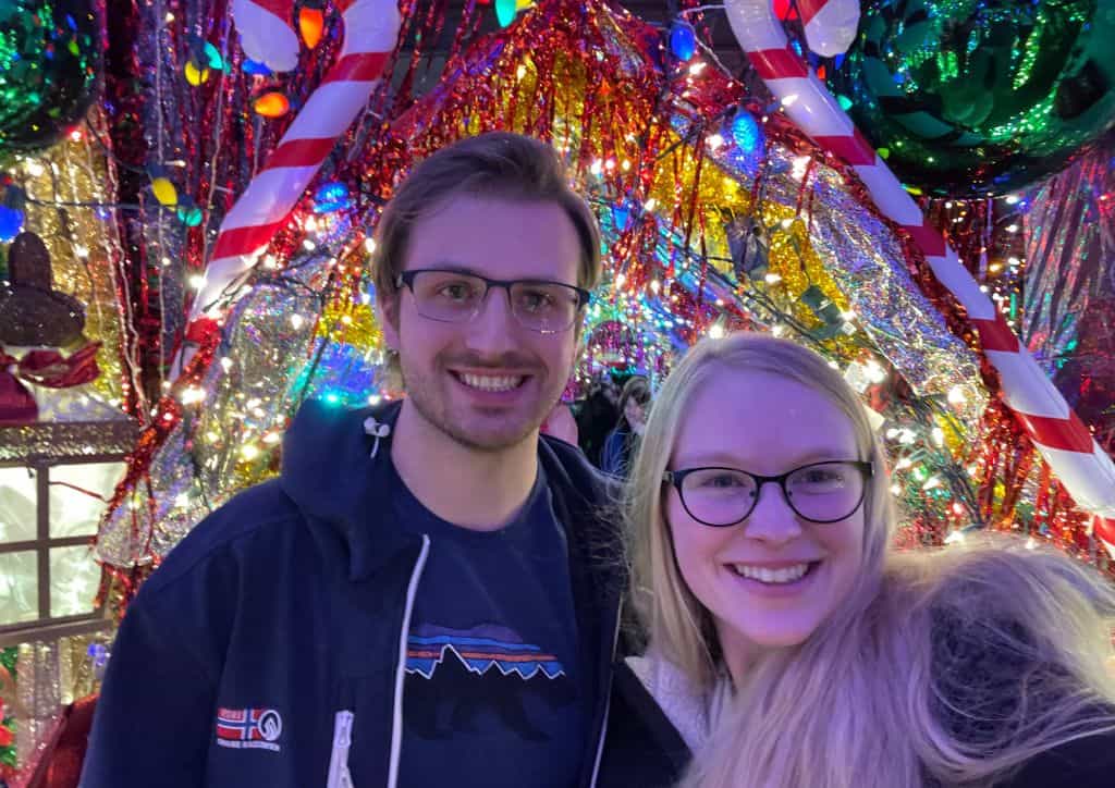 Myself and Tyler under a holiday decorated hallway.