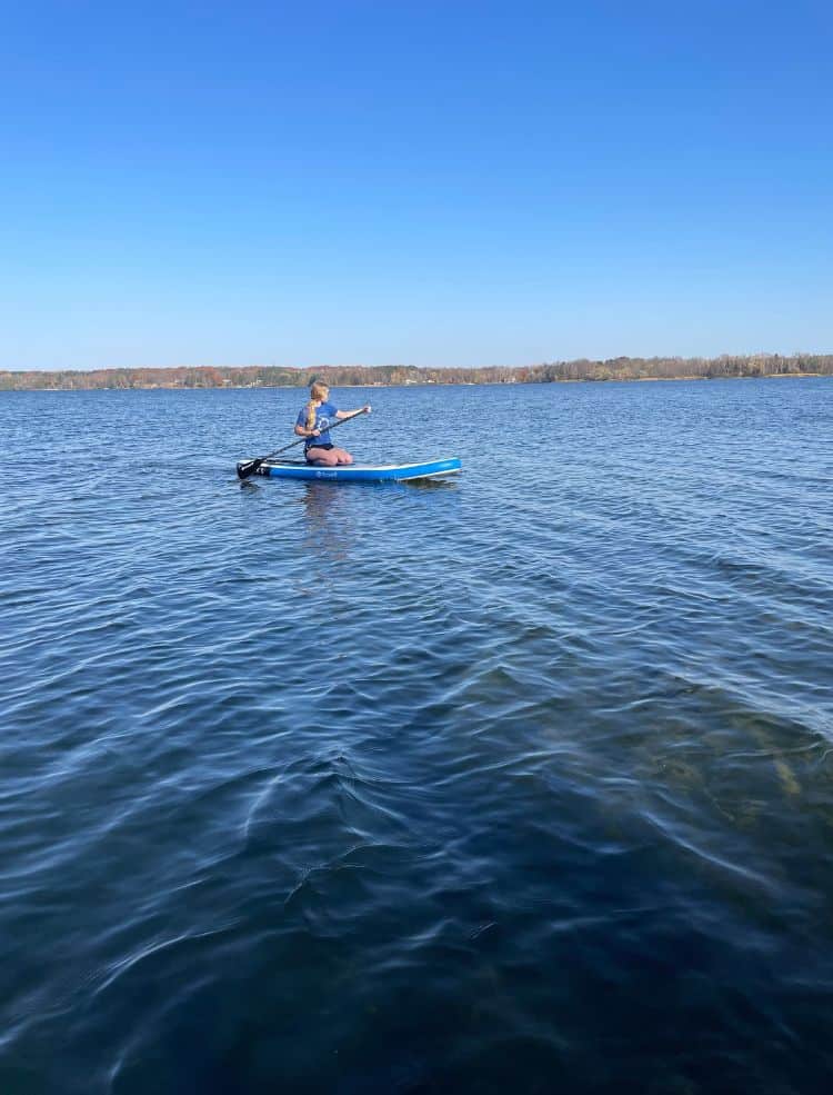 Myself on a paddle board at a pet friendly resort in Minnesota.