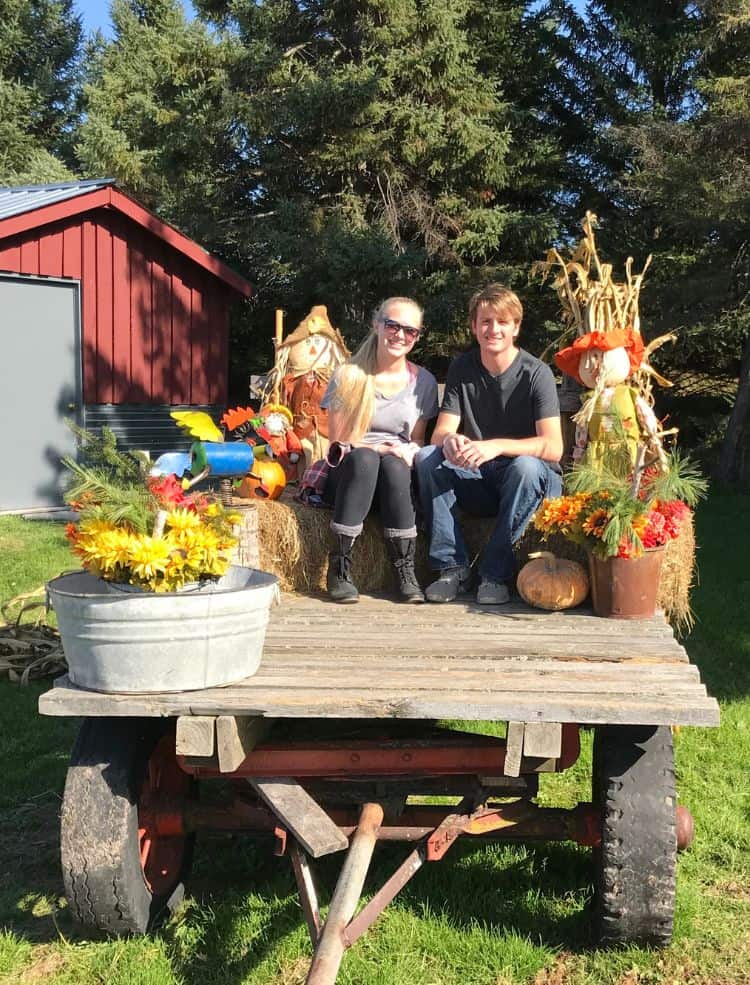 Sitting on a trailer with fall decor at activities in Minneapolis.