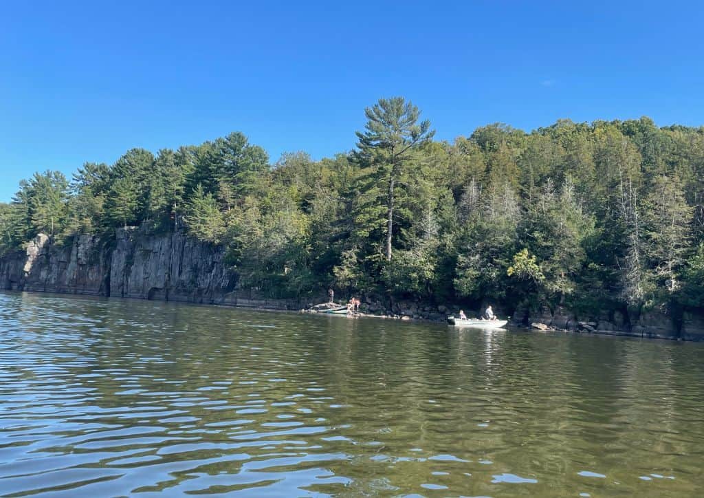 A view of the St. Croix River valley with boats on it.
