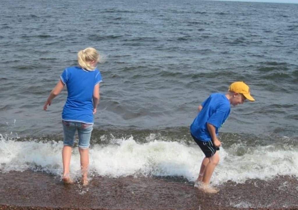 My brother and I splashing on the shore of Lake Superior when we were kids.