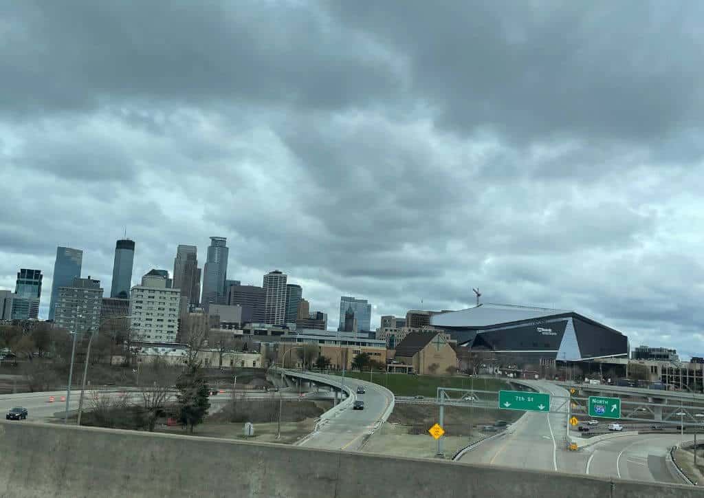 A view of the skyline of Minneapolis and St. Paul with US Bank Stadium in the front.