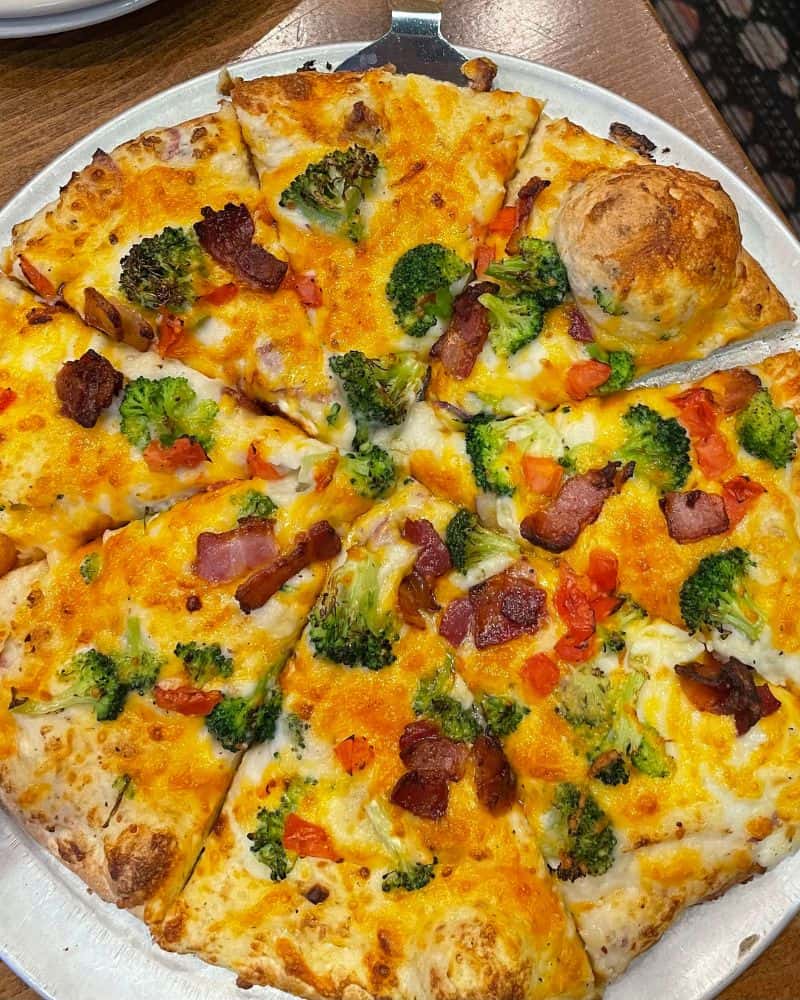 Pizza on a tray at a restaurants near the University of Minnesota campus.