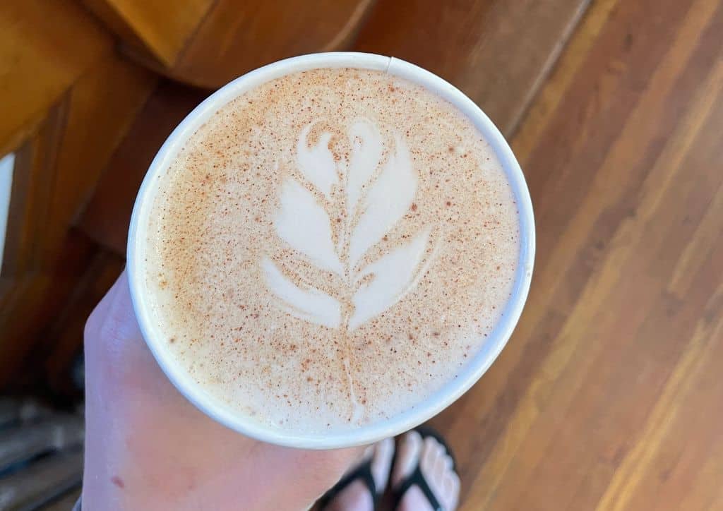 A cup of coffee at a coffee shop.